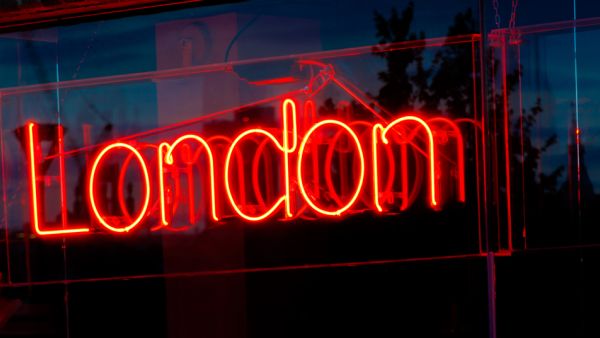 Red neon sign of the word LONDON
