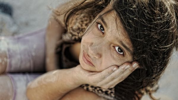 Poverty and poorness on the children face