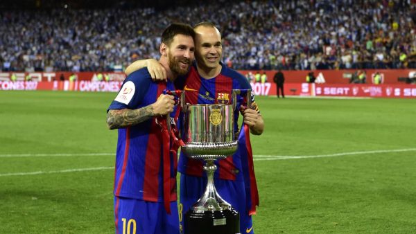 صورة أرشيفية لإنييستا وميسي