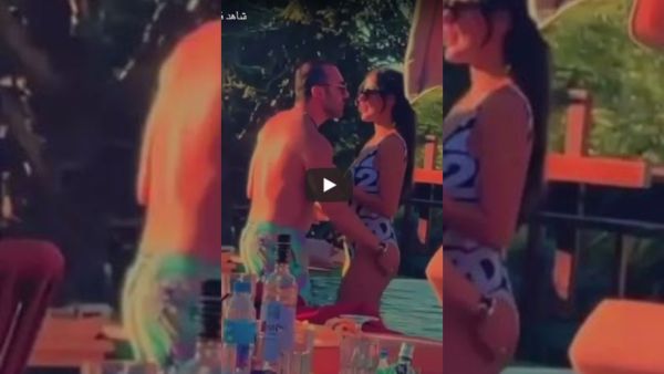 Smack My Butt! Leaked Video of Nadine Njeim As a Man Approches Her Derriere In a Pool