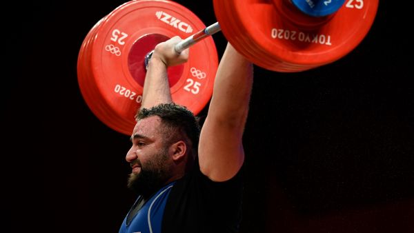 Syria's Man Asaad reacts in the men's +109kg weightlifting competition during the Tokyo 2020 Olympic Games at the Tokyo International Forum in Tokyo on August 4, 2021. (Photo: AFP)