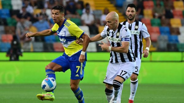 Juventus' Portuguese forward Cristiano Ronaldo (L) fights for the ball with Udinese's Dutch defender Bram Nuytinck during the Italian Serie A football match between Udinese and Juventus at the Dacia Arena Stadium in Udine, on August 22, 2021. (Photo: AFP)