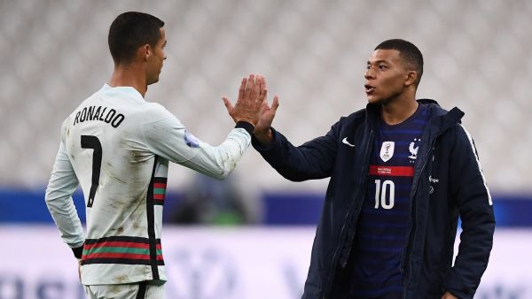 Portugal's forward Cristiano Ronaldo (L) greets France's forward Kylian Mbappe at the end of the Nations League football match between France and Portugal, on October 11, 2020 at the Stade de France in Saint-Denis, outside Paris. (Photo: AFP)