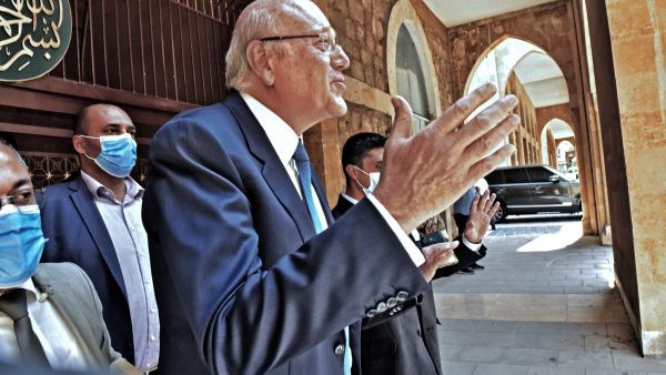 the new government will remain in power for eight months until elections next year