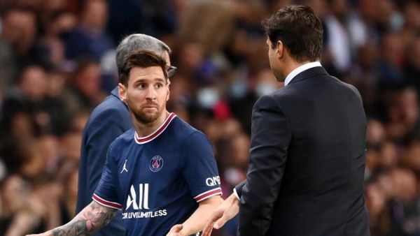 Paris Saint-Germain's Argentinian forward Lionel Messi (C) leaves the pitch after chatting with Paris Saint-Germain's Argentinian head coach Mauricio Pochettino during the French L1 football match between Paris-Saint Germain (PSG) and Olympique Lyonnais at The Parc des Princes Stadium in Paris on September 19, 2021. (Photo: AFP)