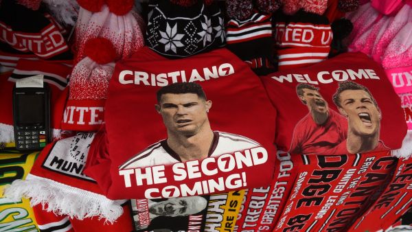 Merchandise featuring new signing Cristiano Ronaldo is seen for sale ahead of the English Premier League football match between Manchester United and Newcastle at Old Trafford in Manchester, north west England, on September 11, 2021. (Photo: AFP)