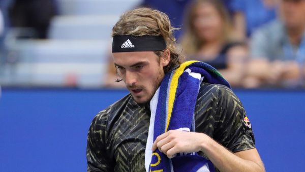 Greece's Stefanos Tsitsipas walks to the other side of the court during his 2021 US Open Tennis tournament men's singles third round match against Spain's Carlos Alcaraz at the USTA Billie Jean King National Tennis Center in New York, on September 3, 2021. (Photo: AFP)