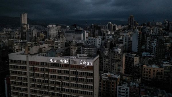 An aerial view shows Lebanon's capital Beirut in darkness during power outage on April 3, 2021. AFP / Dylan COLLINS two main power plants ran out of fuel