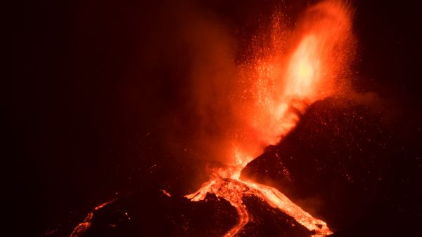 A river of red-hot lava is coming out of La Palma volcano