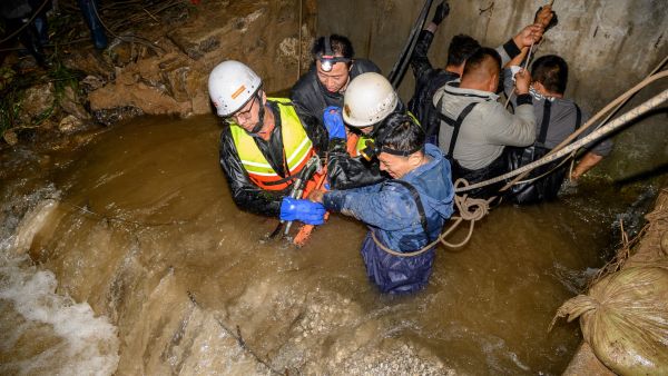 This photo taken on October 10, 2021 shows rescuers drawing water at a flooded area after heavy rainfalls in Jiexiu, in Jinzhong city, China's northern Shanxi province. (Photo by AFP) 15 killed, nearly 2 million others affected by floods in Shanxi province