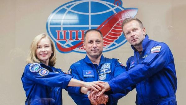 Russian cosmonaut Anton Shkaplerov, actor Yulia Peresild, and film producer Klim Shipenko