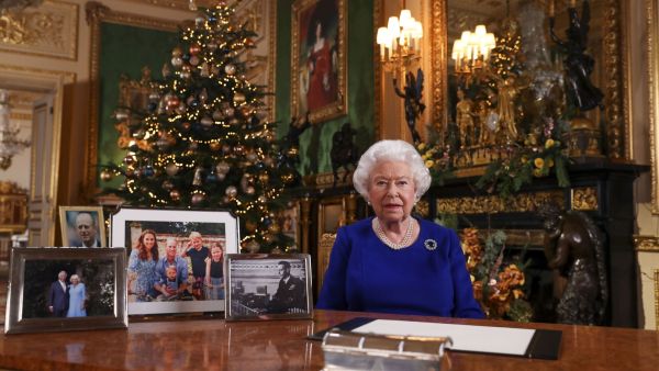 Windsor Castle's Garter Tower is illuminated with images of the stained glass architecture and motifs from St George's Chapel dating back to the 15th century
