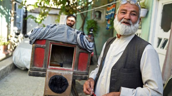 Haji Mirzaman of the old camera past 
