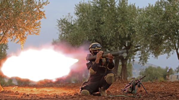 A Turkish-backed Syrian rebel fighter takes part in a military exercise in the countryside of Afrin in the rebel-held Aleppo province, on October 31, 2021. (Photo by Bakr ALKASEM / AFP) 2 civilians killed in regime attack in Syria’s northern Aleppo
