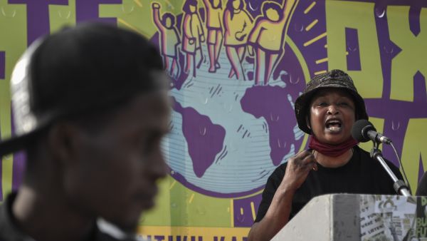 Demonstrators seek government support for those affected by natural disasters