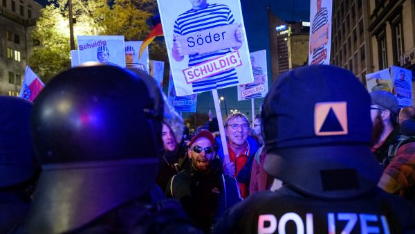 Police and protesters against Covid passports clashed during a rally in Leipzig