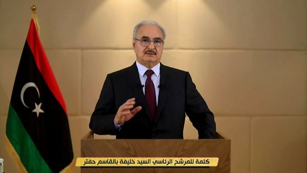 This image grab from Libyan television channel Libya Alhadath TV on November 16, 2021, shows east Libya strongman Khalifa Haftar announcing his candidacy for the next month's presidential election during a televised speech. (Photo by LIBYA ALHADATH TV / AFP) Libyan warlord Haftar announces bid to run for presidential election