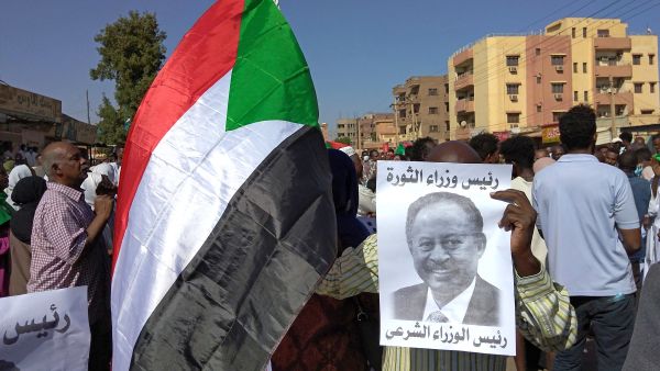 Thousands took to the streets in Khartoum and other cities but were met by the deadliest crackdown since the coup. (Photo by AFP) ousted prime minister is currently on his way to the royal palace to meet Al-Burhan