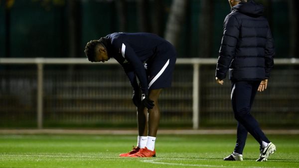 France's midfielder Paul Pogba reacts after getting injured during a training session as part of the team's preparation for the upcoming 2022 World Cup qualifying matches in Clairefontaine-en-Yvelines. The French football federation said on November 8 that Pogba, injured during the training, will not play in the upcoming World Cup qualifiers, announcing his replacement by Jordan Veretout. (Photo: AFP) 