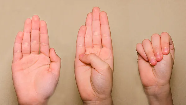 domestic violence hand gesture