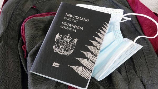 New Zealand unveils plan to re-open borders starting early January