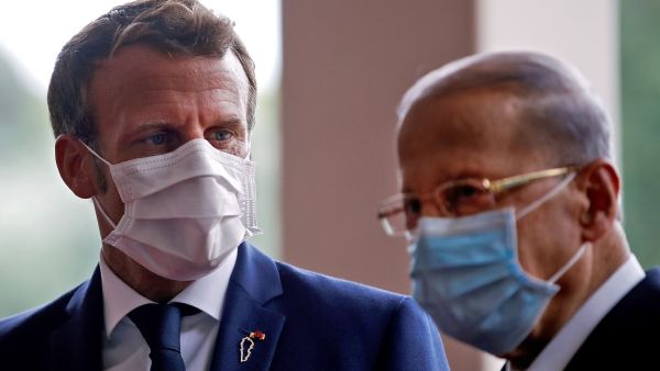 French President Emmanuel Macron (L) meets with Lebanese President Michel Aoun at the Presidential palace in Baabda, east of the Lebanese capital Beirut, on September 1, 2020. / AFP / POOL / GONZALO FUENTESv French Ambassador to Lebanon Anne Griot briefed Lebanese President Michel Aoun on Macron’s Gulf tour,