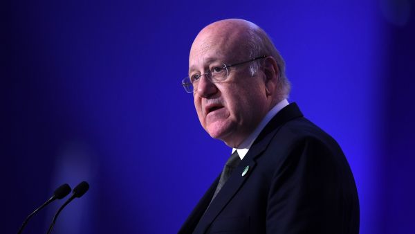 Lebanon's Prime Minister Najib Mikati makes a national statement on the second day of the COP26 UN Climate Summit in Glasgow on November 2, 2021. (Photo by Daniel LEAL / POOL / AFP) Lebanon aims to restore Arab trust