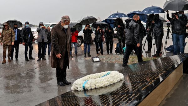 UN Secretary-General Antonio Guterres lays a wreath on December 20, 2021, at the site of the August 4, 2020 cataclysmic port explosion that ravaged the Lebanese capital Beirut. (Photo by anwar amro / AFP) Lebanese Prime Minister Najib Mikati met UN Secretary-General Antonio Guterres