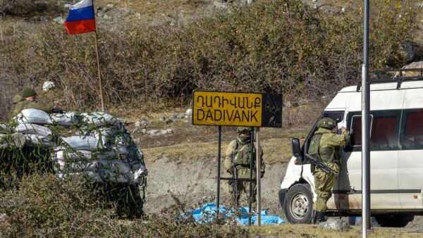 Russian peacekeepers check a car outside the village of Dadivank on November 23, 2020. AFP / Karen MINASYAN Russian peacekeepers begin pullout from Kazakhstan