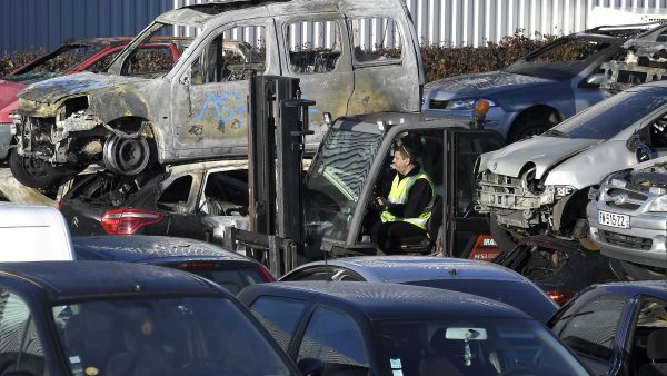 A total of 874 cars were set on fire throughout France amid New Year's Eve celebrations