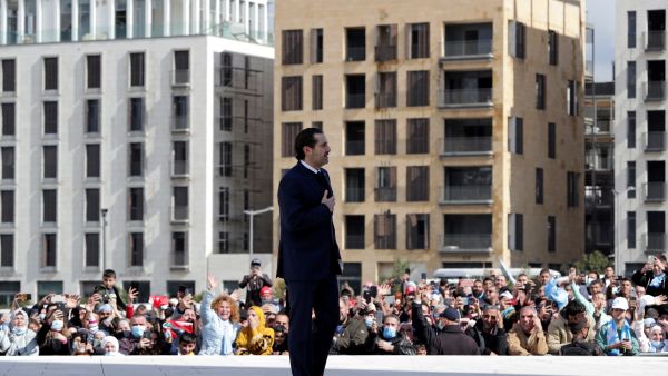 Lebanon's former premier Saad Hariri greets his supporters after visiting the gravesite of his father, slain prime minister Rafiq Hariri, in downtown Beirut on February 14, 2022, as Lebanon marked the 17th anniversary of his assassination. (Photo by ANWAR AMRO / AFP) Rafik Hariri was killed 17 years ago
