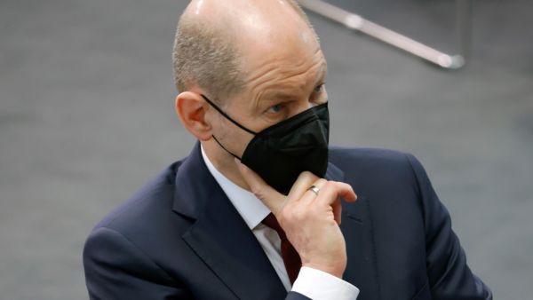 German Chancellor Olaf Scholz attends the assembly of the Federal Convention on February 13, 2022 at the Paul-Loebe-Haus parliamentary building in Berlin, prior to the election of Germany's President. (Photo by MICHELE TANTUSSI / POOL / AFP) German leader Olaf Scholz