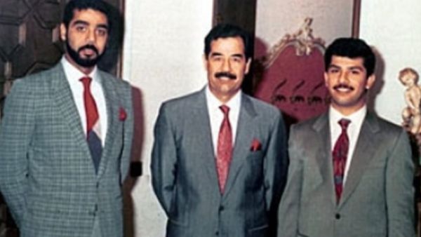 الرئيس العراقي الراحل صدام حسين ونجليه عدي وقصي
