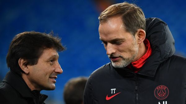 Paris Saint-Germain's Brazilian sporting director Leonardo (L) talks to Paris Saint-Germain's German coach Thomas Tuchel (R) during a training session at the Santiago Bernabeu stadium in Madrid on November 25, 2019, on the eve of their UEFA Champions League football match against Real Madrid CF. / AFP / GABRIEL BOUYS