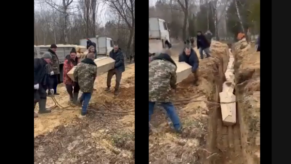 The video showed a mass grave being prepared but online people had different narratives. (Twitter) Mass grave in Ukraine
