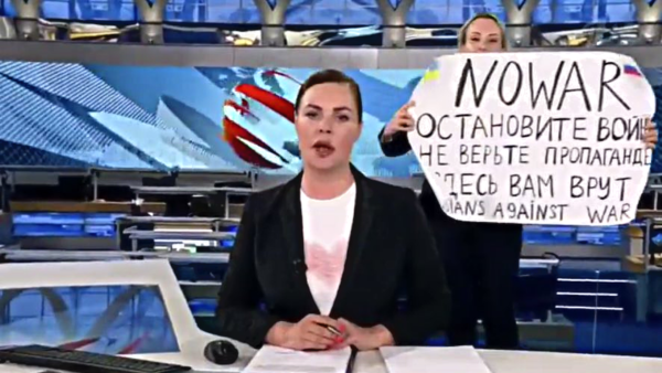 Marina Ovsyannikova walked into the main evening news on Channel One Russia with a no-war sign.. (Twitter) Russian protestor TV