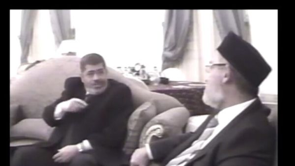 محمد مرسي ومحمد بديع