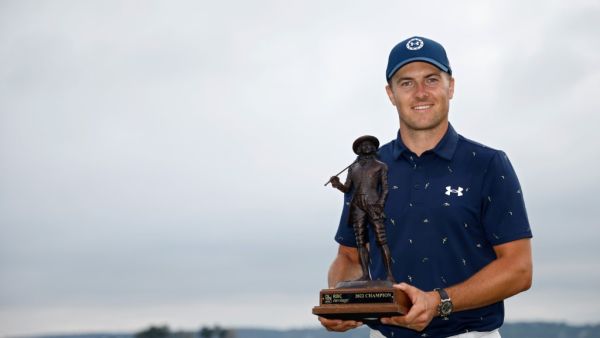 Jordan Spieth poses with the trophy after winning the RBC Heritage in a playoff at Harbor Town Golf Links on April 17, 2022 in Hilton Head Island, South Carolina. Jared C. Tilton/Getty Images/AFP (Photo by Jared C. Tilton / GETTY IMAGES NORTH AMERICA / Getty Images via AFP)