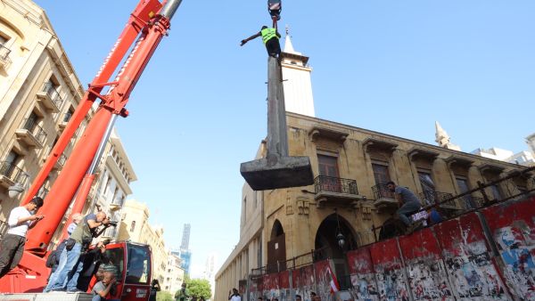 Authorities remove 'wall of shame' around Parliament building