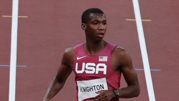 USA's Erriyon Knighton competes in the men's 200m semi-finals during the Tokyo 2020 Olympic Games at the Olympic Stadium in Tokyo on August 3, 2021. (Photo by Giuseppe CACACE / AFP)