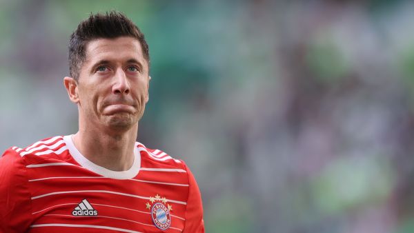 Bayern Munich's Polish forward Robert Lewandowski reacts after the German first division Bundesliga football match VfL Wolfsburg v Bayern Munich in Wolfsburg, northern Germany, on May 14, 2022. (Photo by Ronny Hartmann / AFP) 