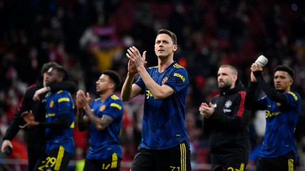 Manchester United's Serbian midfielder Nemanja Matic and teammates react at the end of the UEFA Champions League football match between Atletico de Madrid and Manchester United at the Wanda Metropolitano stadium in Madrid on February 23, 2022. (Photo by OSCAR DEL POZO / AFP)