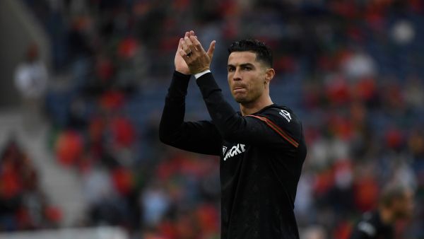Portugal's forward Cristiano Ronaldo gestures before the start of the World Cup 2022 qualifying final first leg football match between Portugal and North Macedonia at the Dragao stadium in Porto on March 29, 2022. (Photo by MIGUEL RIOPA / AFP)
