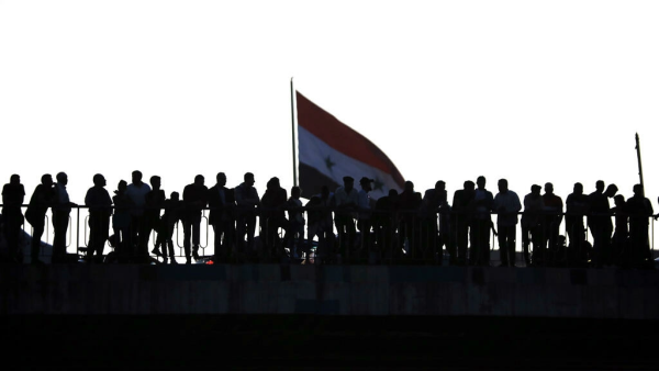 Syrians await the release of jailed relatives after a general amnesty was issued LOUAI BESHARA AFP Syrians await the release of jailed relatives