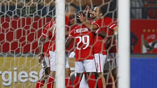 Ahly's players celebrate at the end of the CAF Champions League semi-final match between Egypt's al-Ahly and Algeria's ES Setif at the al-Salam stadium in Cairo on May 7, 2022. (Photo by Khaled DESOUKI / AFP)