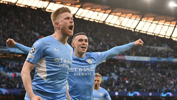Manchester City's Belgian midfielder Kevin De Bruyne celebrates after scoring a goal during the UEFA Champions League semi-final first leg football match between Manchester City and Real Madrid, at the Etihad Stadium, in Manchester, on April 26, 2022. (Photo by Paul ELLIS / AFP)