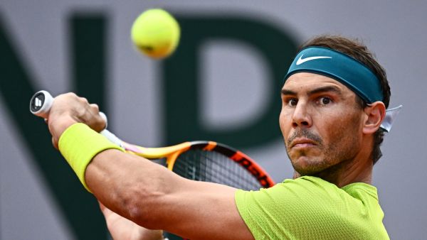 Spain's Rafael Nadal returns the ball to Netherland's Botic Van De Zandschulp during their men's singles match on day six of the Roland-Garros Open tennis tournament at the Court Suzanne-Lenglen in Paris on May 27, 2022. (Photo by Anne-Christine POUJOULAT / AFP)