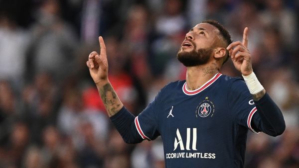 Paris Saint-Germain's Brazilian forward Neymar celebrates after scoring a penalty during the French L1 football match between Paris-Saint Germain (PSG) and ES Troyes AC at The Parc des Princes Stadium in Paris on May 8, 2022. (Photo by Anne-Christine POUJOULAT / AFP)