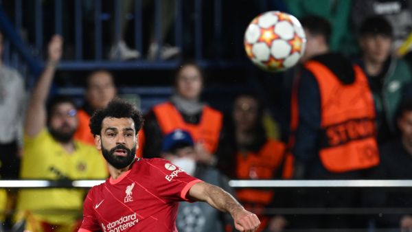 Liverpool's Egyptian midfielder Mohamed Salah eyes the ball during the UEFA Champions League semi final second leg football match between Liverpool and Villarreal CF at La Ceramica stadium in Vila-real on May 3, 2022. (Photo by Paul ELLIS / AFP)