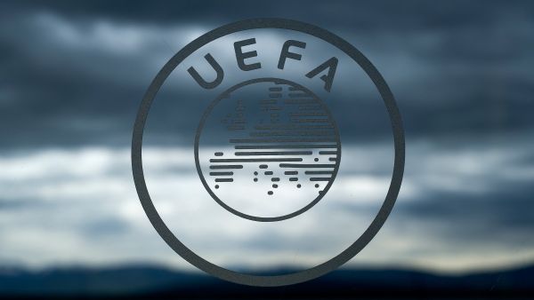 UEFA logo (Photo by FABRICE COFFRINI / AFP)